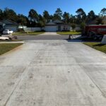 Concrete driveway in a suburban neighborhood.