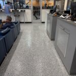 Interior view of Quick Lane Tire & Auto Center at Murray Ford of Kingsland showing customer seating area and service counters.