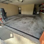 Garage floor prep work by Checkmate Coatings